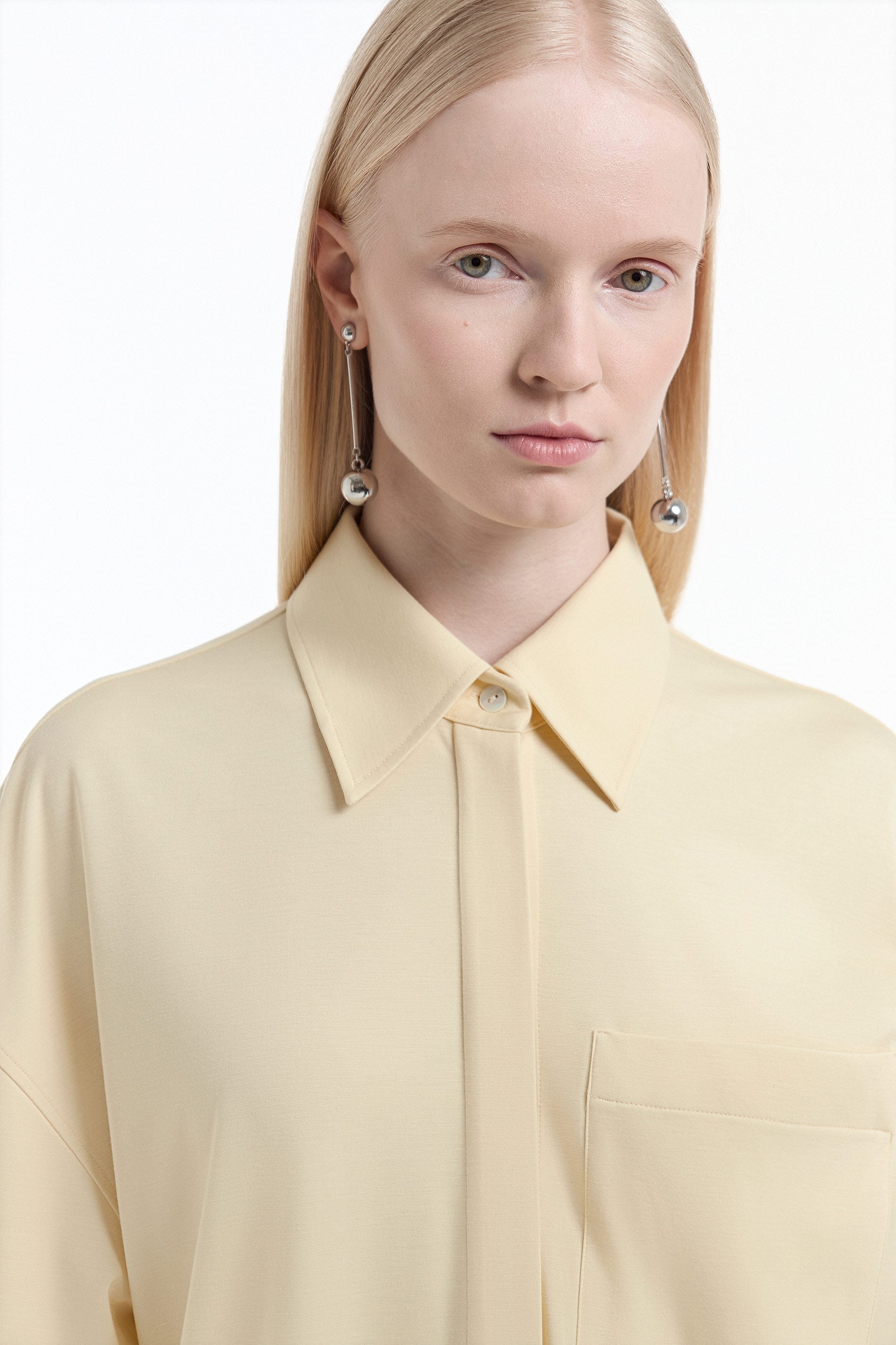 Knit shirt with a pocket PINXIT